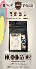 A package of FiveO Morning Star Omnilight Roast coffee beans displayed on a white pedestal. The product packaging is a black stand-up pouch with a white and multicolor label.