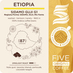 eticheta produsului Cafea de specialitate Five Origins Etiopia Sidamo Guji G1, cu note de iasomie, portocală și ciocolată neagră.